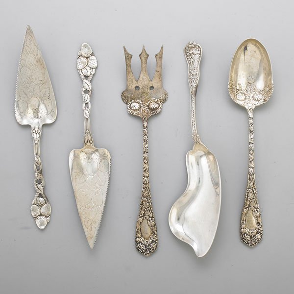 FIVE ORNATE SILVER SERVING UTENSILS: Two Strawberry pie servers, pair of salad servers, fish slice; 20th c.; Recasts; Longest, 11 1/2"; 28.7 OT