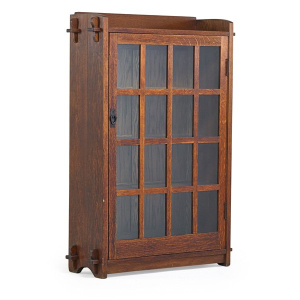 GUSTAV STICKLEY Single-door bookcase: GUSTAV STICKLEY Single-door bookcase, Eastwood, NY, ca. 1912; Paper label, stamped 333; 56" x 38" x 13" Provenance: Rago Auctions