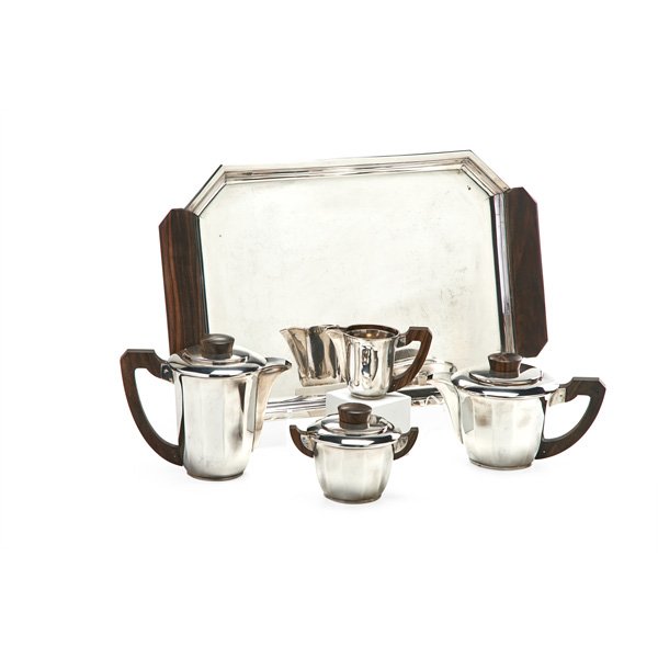 SAGLIER FRERES ET CIE Assembled tea and coffee set: SAGLIER FRERES ET CIE Tea and coffee set on associated tray, France, 1920s; Sterling silver, rosewood; French marks; Coffee pot: 6 3/4" x 8", tray: 20 1/4" x 12 3/4"