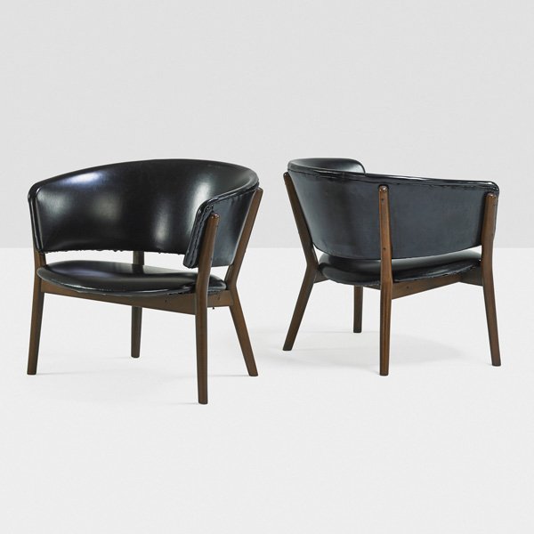 NANNA AND JORGEN DITZEL; SELIG Pair of chairs: NANNA DITZEL (1923 - 2005) JORGEN DITZEL (1921 - 1961) SELIG Pair of Barrel chairs, Denmark, 1960s; Stained and lacquered beech, vinyl; Metal labels; 27" x 30 1/2" x 26"