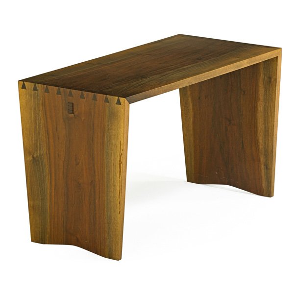GEORGE NAKASHIMA Side table: GEORGE NAKASHIMA (1905 - 1990) NAKASHIMA STUDIOS Dovetailed side table "in the style of a piano bench," New Hope, PA, 1979; Figured walnut, rosewood; Unmarked; 22" x 36" x 18" Provenance available: Co