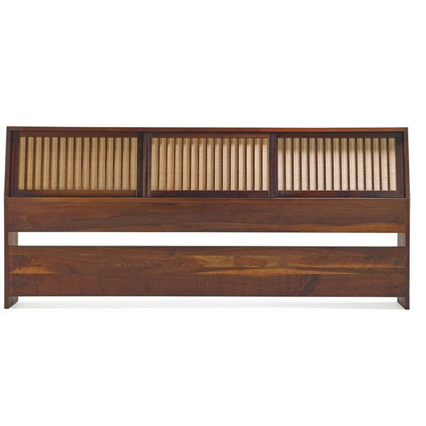 GEORGE NAKASHIMA King-size headboard: GEORGE NAKASHIMA (1905 - 1990) NAKASHIMA STUDIOS King-size headboard, New Hope, PA, 1963; Walnut, pandanus cloth; 36" x 80" x 12" Provenance available: copy of original order card.