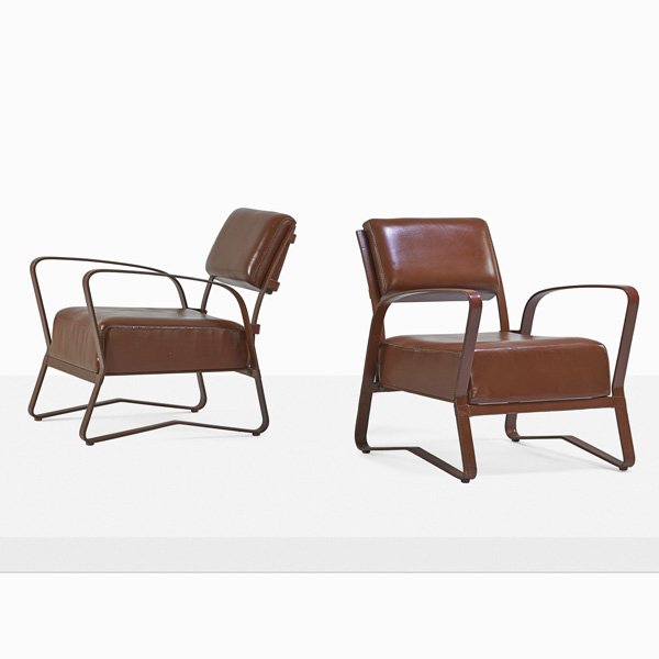 JACQUES ADNET Pair of lounge chairs: JACQUES ADNET (1901 - 1984) Pair of lounge chairs, France, 1960s; Stitched leather, brass; Unmarked; 29 1/2" x 25" x 32"
