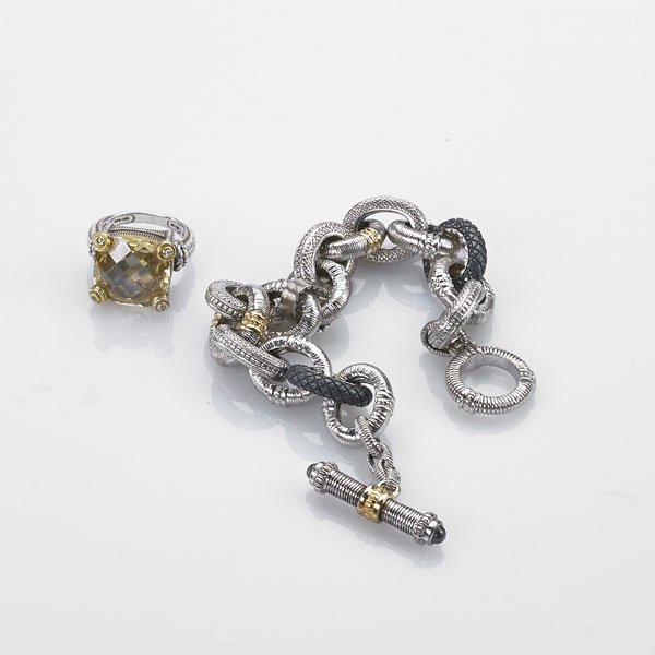 JUDITH RIPKA STERLING BRACELET AND GEMSTONE RING: Large faceted quartz ring tipped by 18k yg. bezel set RBC diamonds, approx. .04 ct. TW, embossed sterling shoulders, size 6 3/4; Bracelet with oval embossed sterling links, 18k yg. accents, toggle clo