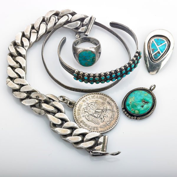 MEXICAN AND NATIVE AMERICAN SILVER JEWELRY: Six pieces: Massive Mexican silver curb link bracelet, 7 1/2", suspends a large love token charm; Zuni petit point turquoise open cuff; Sterling bangle; Pair of turquoise mosaic ear clips; Ring, size 