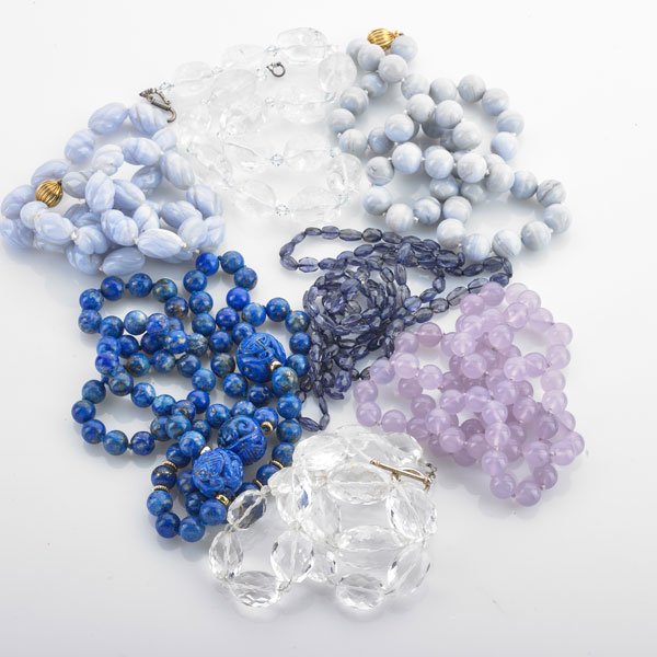 SEVEN HARDSTONE OR SEMIPRECIOUS BEAD NECKLACES: Chinese carved lapis, faceted iolites, lace agate, rock crystal and lavender chalcedony beads, some with 14k yg. findings; Longest 38"