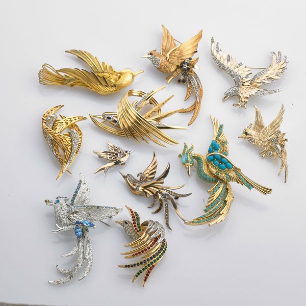 BOUCHER AND OTHER BIRD BROOCHES: Eleven pieces: Eight by Marcel Boucher, smallest two with Phrygian Cap mark, six with later marks include jeweled and plain gold tone brooches; Three unmarked or unidentified includes "turquoise" Phoe