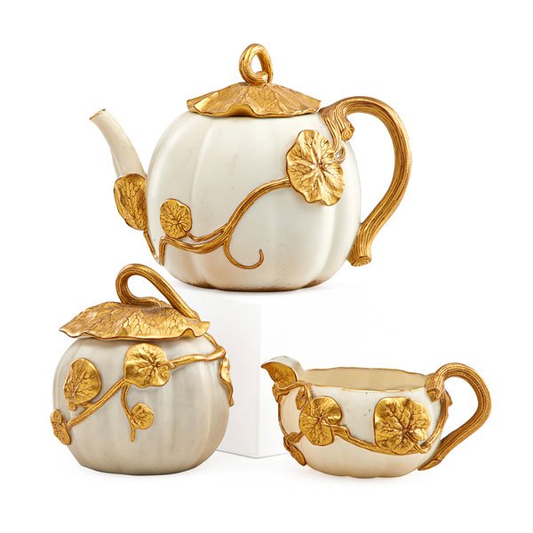 ROYAL WORCESTER TEA SERVICE: Teapot, creamer, and sugar with melon form bodies, ca. 1890; Marked; Tallest: 6"