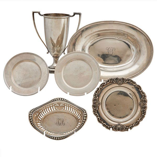 SILVER BOWLS AND LOVING CUP: Six pieces: R. Wallace & Sons sterling loving cup, 8 1/4"; Tiffany & Co. oblong shallow bowl, monogrammed, 11 1/2" x 8 3/8"; Gorham candy dish with floral border, 7"; Gorham small pierced oblong dish,