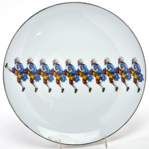 HOWARD KOTTLER: Transfer-decorated porcelain plate with kicking colonial man, USA, late 20th c.; Ink stamped HOWARD KOTTLER; 1" x 10" dia.