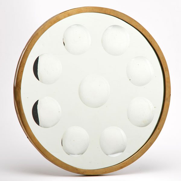 STYLE OF FELICIANO BEJAR: Circular wall hanging mirror with ground mirrored glass, 20th c.; Brass, mirrored glass, painted wood; Unmarked; 1/2" x 16 1/2" dia.