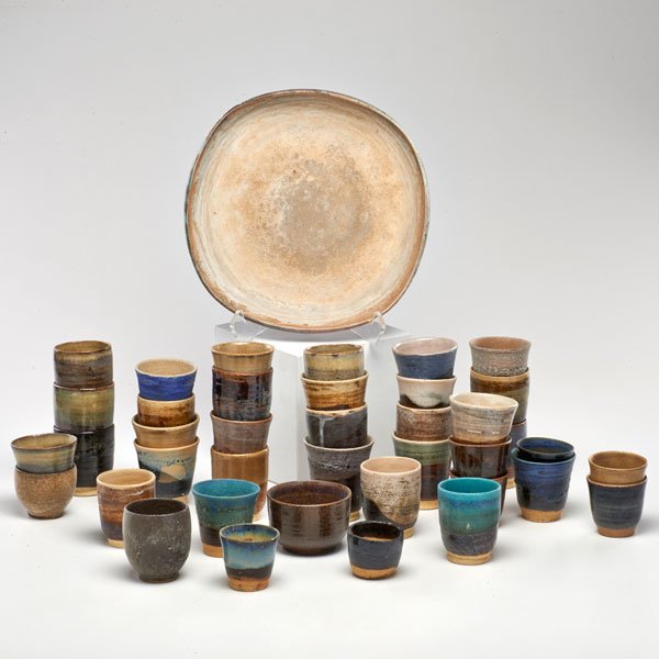EDWIN SCHEIER; MARY SCHEIER: About thirty-six assorted glaze test tile cups together with low square bowl, Green Valley, AZ; Most signed, some dated, most with code numbers for glazes; Tallest: 3" x 2 1/5"