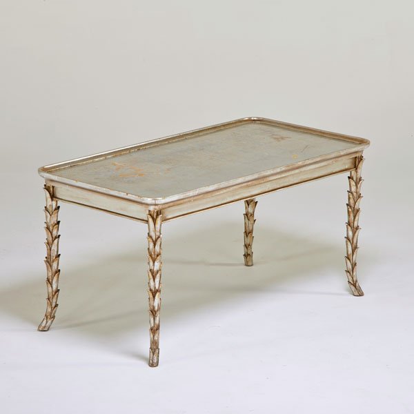HOLLYWOOD REGENCY STYLE: Coffee table, USA, 1960s; Silver leaf, wood; Unmarked; 22" x 44" x 22"