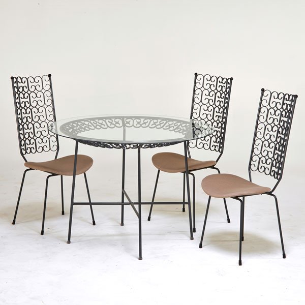 ARTHUR UMANOFF: Dining table and three chairs, USA, 1950s; Enameled steel, glass, upholstery; Unmarked; Table: 30" x 42" dia., chair: 39 1/2" x 18 1/2" x 21"