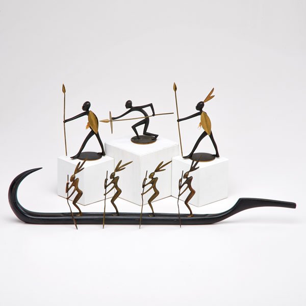 FRANZ HAGENAUER; HAGENAUER WEIN: Four sculptures: warriors rowing a canoe and three warrior figures, 1930s; Bronze and wood; Three figures stamped HAGENAUER WEIN MADE IN AUSTRIA; Tallest: 5 3/4"