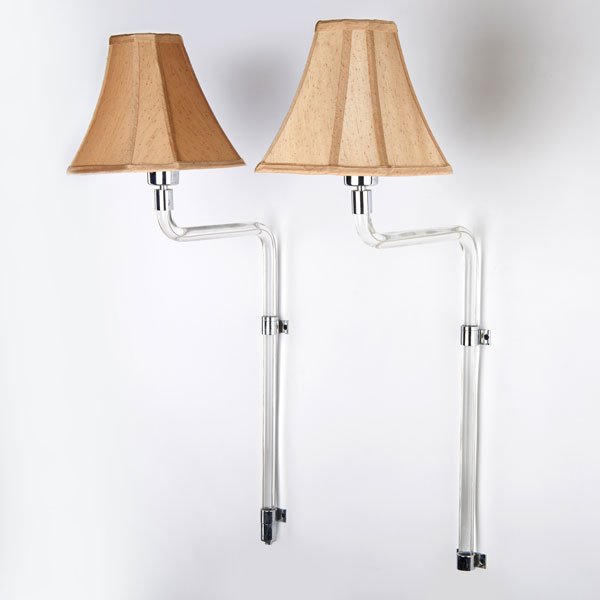 PETER HAMBURGER; KNOLL INTERNATIONAL: Pair of swing-arm wall sconces, USA, 1970s; Chromed steel, lucite; Unmarked; 36" x 13"