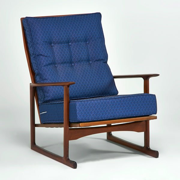 SELIG: Tallback lounge chair, Denmark, 1960s; Sculpted teak, upholstery; Manufacturer metal label; 35" x 29" x 34"