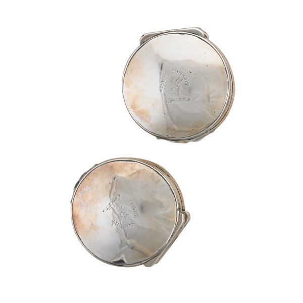 PAIR OF SILVER NUTMEG GRATERS: George III, maker William Robertson, c. 1790; Engraved; 2 1/2" dia.; 4.14 OT