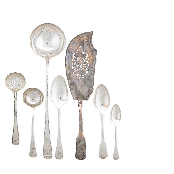 ENGLISH STERLING UTENSILS: Twenty-four pieces with various crest monograms including spoons, ladles, a fish server, spoons with shell bowls, a skewer, by makers: Chawner & Co., George Smith III, William Sumner I, Adey Bellamy S