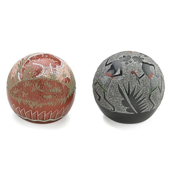 SANTA CLARA PUEBLO POTTERY: Two pieces, one blackware sgraffito seed jar by Joseph Lone Wolf and one polychrome sgraffito seed jar by Gregory Lone Wolf titled "Cottontail Rabbit," 20th c.; Both signed; Blackware: 1 1/4" x 1 1/4"