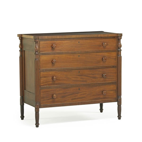 SHERATON CHEST OF DRAWERS: Mahogany with four long graduated drawers flanked by reeded columnar supports, American, ca. 1820; 40” x 44” x 22”
