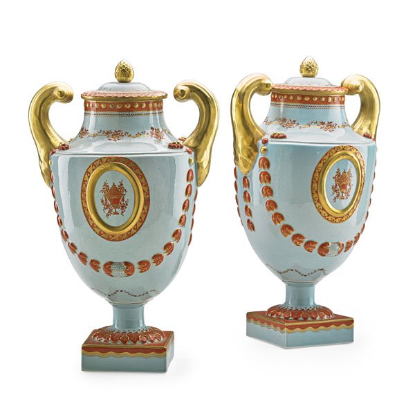 PAIR OF MOTTAHEDEH PORCELAIN COVERED URNS: Lowestoff reproductions with gilt detail, Continental, 20th c.; 16 1/2"