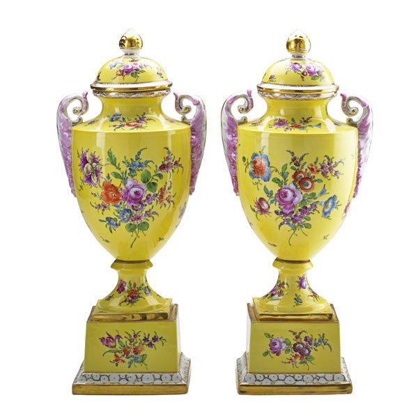PAIR OF GERMAN PORCELAIN URNS: Hand-painted floral decoration on yellow ground with Meissen type cross sword marks, early 20th c.;16"