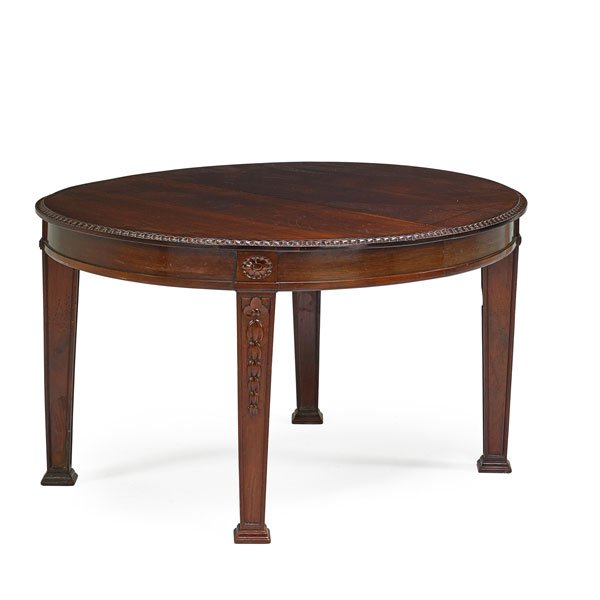 GEORGE III STYLE DINING ROOM TABLE: Mahogany, tapered leg with spade feet, 20th c.; Two 19 3/4" associated leaves; 29 1/2" x 53" x 46 1/2"
