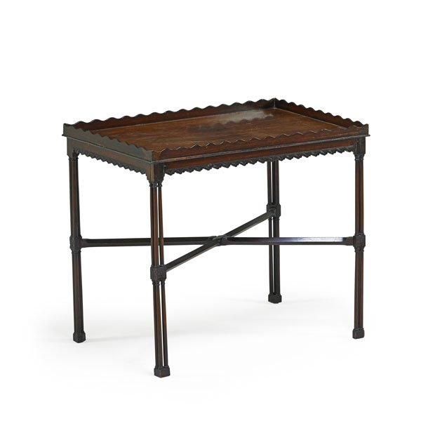GEORGE III TEA TABLE: Mahogany, gallery top clustered columnar x-stretcher, late 18th c.; 29" x 33" x 21 1/2"