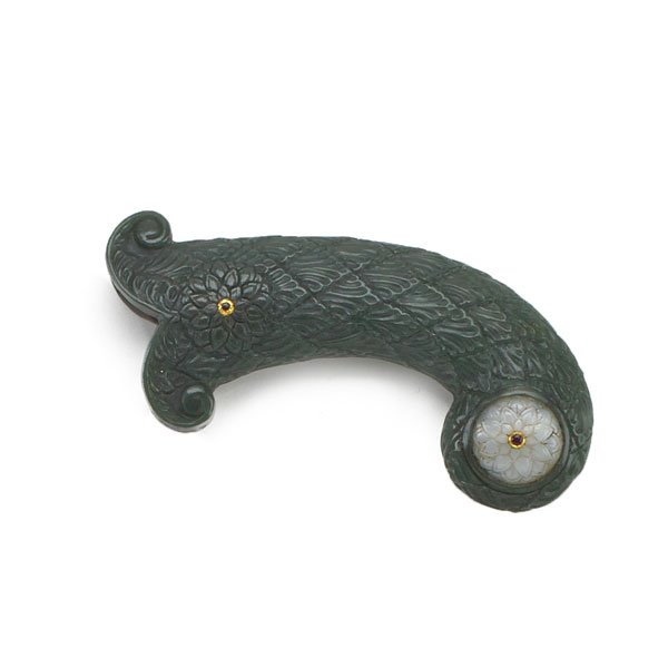 MUGHAL STYLE CARVED JADE SHAMSHIR GRIP: Horse form gem set spinach jade with inset white jade disk, 20th c.; 6 1/4" x 5" x 1"