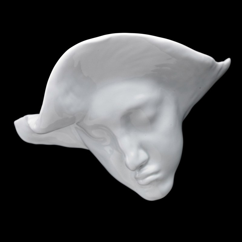 ANTOINE BOURDELLE; THEODORE HAVILAND "Visage": ANTOINE BOURDELLE (1861 - 1929) THEODORE HAVILAND Glazed porcelain sculpture, "Visage," France, ca. 1916; Signed and titled, Visage Bourdelle; 8" x 10" Note: This model was shown in a faux-marble fini
