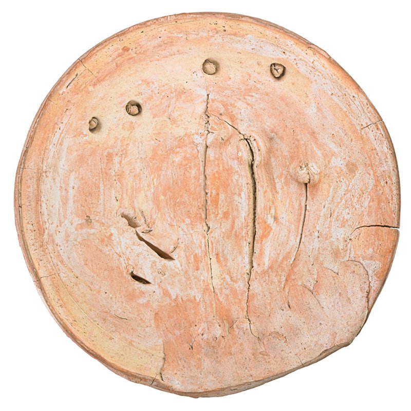 PETER VOULKOS Ceramic charger: PETER VOULKOS (1924 - 2002) Unglazed ceramic charger, Birmingham, AL, 1972; Unmarked; 3 3/4" x 19" Provenance: Private collection, made during a ceramics workshop Voulkos taught at the University of A