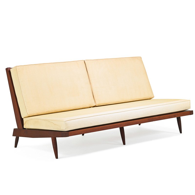 GEORGE NAKASHIMA Cushion sofa: GEORGE NAKASHIMA (1905 - 1990) NAKASHIMA STUDIOS Cushion sofa, New Hope, PA, mid 1950s; Walnut, upholstery; Unmarked; 31" x 72" x 34" Provenance available: Letter of authentication from Mira Nakashima