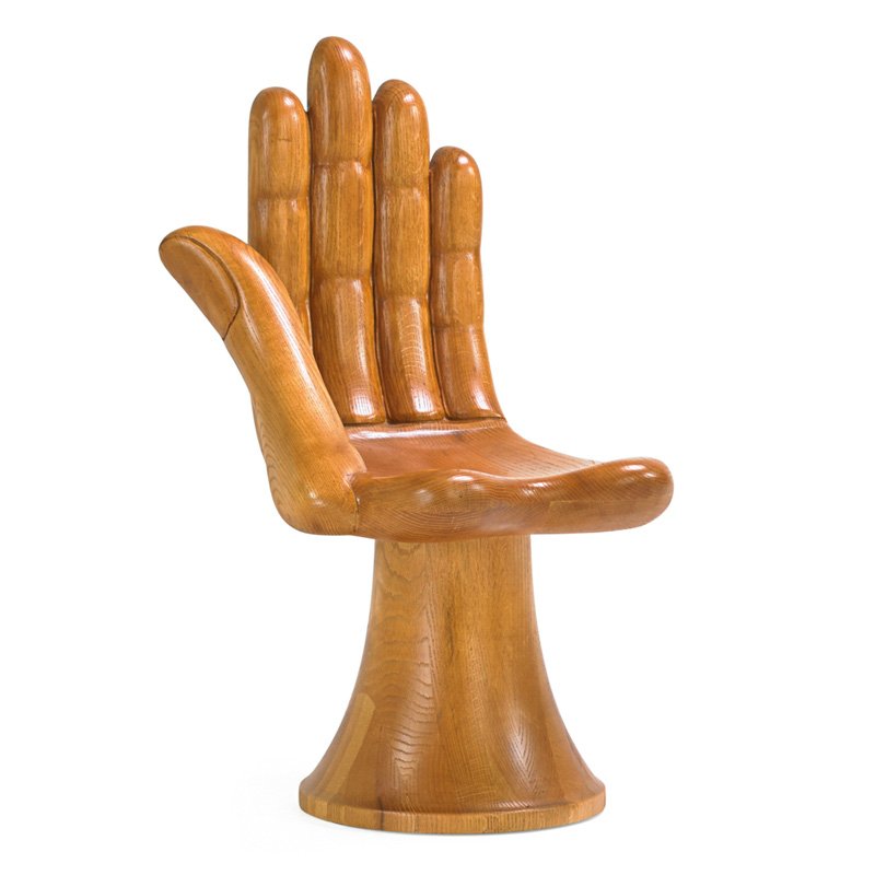 STYLE OF PEDRO FRIEDEBERG Hand chair: STYLE OF PEDRO FRIEDEBERG Hand chair, 1970s; Carved solid oak; Unmarked; 35 1/2" x 20" x 21"
