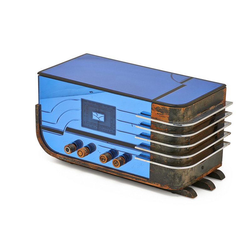 WALTER DORWIN TEAGUE; SPARTON Table radio: WALTER DORWIN TEAGUE (1883 - 1960) SPARTON Table radio (no. 558), Jackson, MI, ca. 1936; Blue-tinted mirror glass, metal, wood; Marked Sparton; 9" x 17 1/2" x 8"