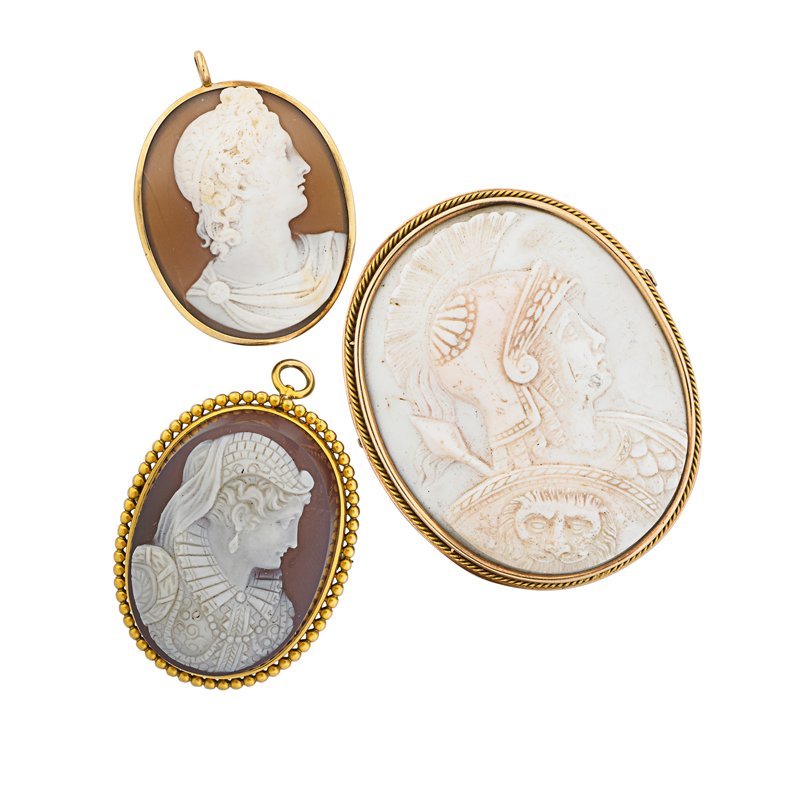 THREE VICTORIAN GOLD MOUNTED CAMEOS: Greek youth shell cameo in 14k pendant mount; Roman soldier conch shell in Russian 583 gold brooch mount; Elizabethan woman sardonyx cameo 14k gold brooch. Largest 2 1/8". 32.1 dwt. Property from the 