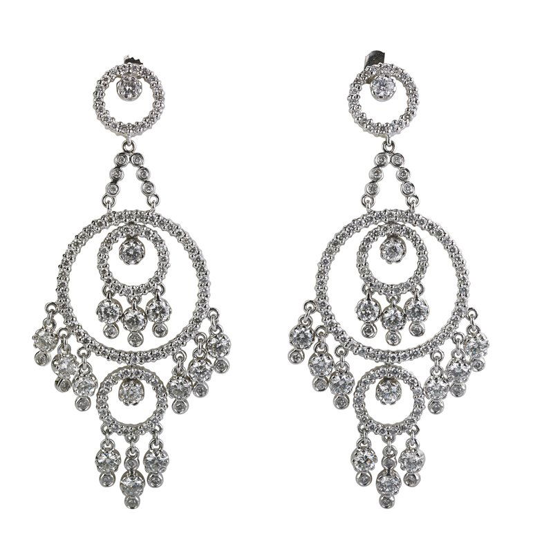 DIAMOND 18K WHITE GOLD CHANDLIER EARRINGS: Articulated concentric circles and fringe set with numerous RBC diamonds, 6.67 cts. TW. 2 3/4". 14.7 dwt.