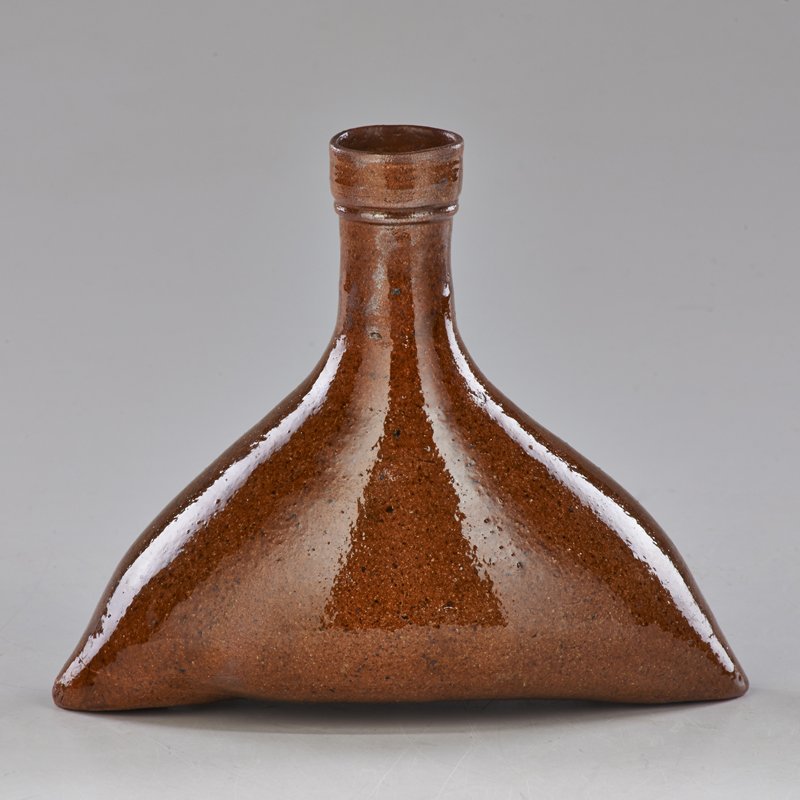 GEORGE OHR: Wide based bottle, ca. 1890-1900; Glazed earthenware; Stamped G.E. OHR, BILOXI; 6 1/2" x 8" x 4 1/4"