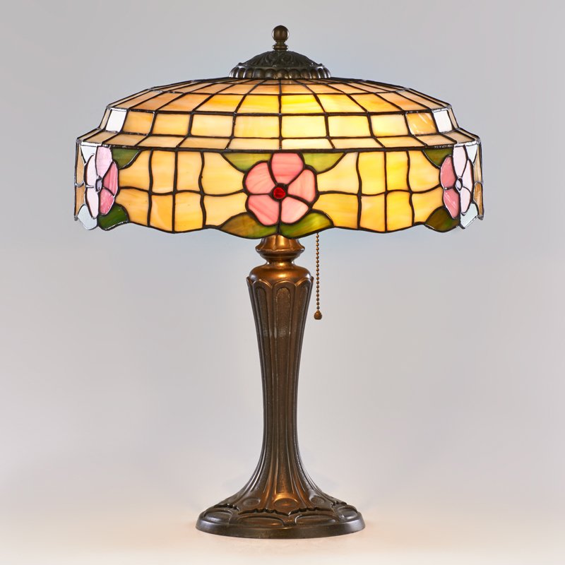 ARTS AND CRAFTS: Leaded slag glass table lamp with patinated metal base; Unmarked; 20 1/4" x 17" dia.