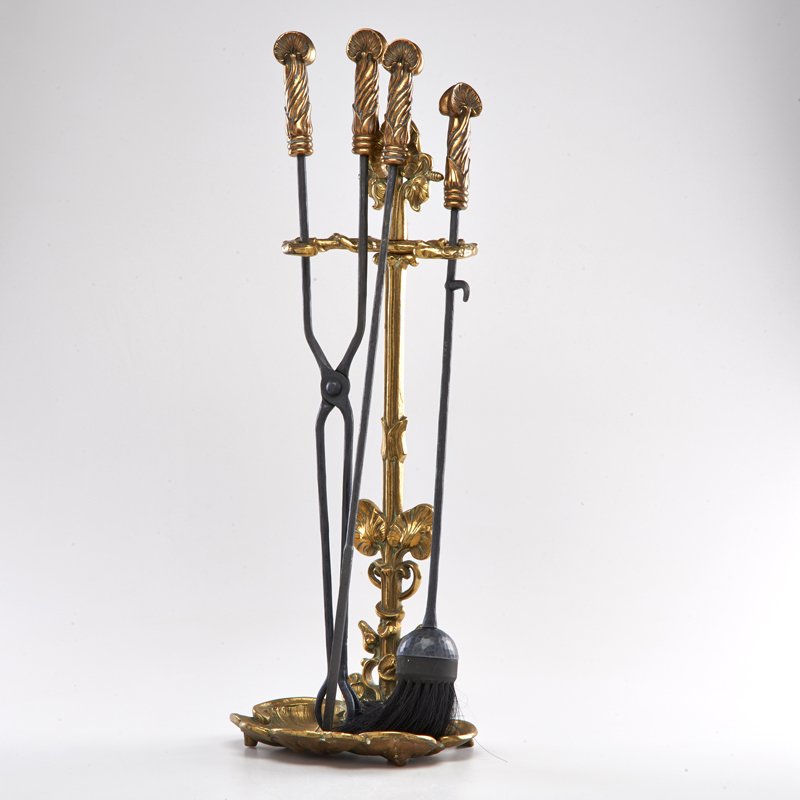 ART NOUVEAU STYLE: Contemporary set of fire place tools: poker, tongs, brush, and stand, 20th c.; Brass and iron; Overall: 30" x 9 1/2" x 7 1/2"