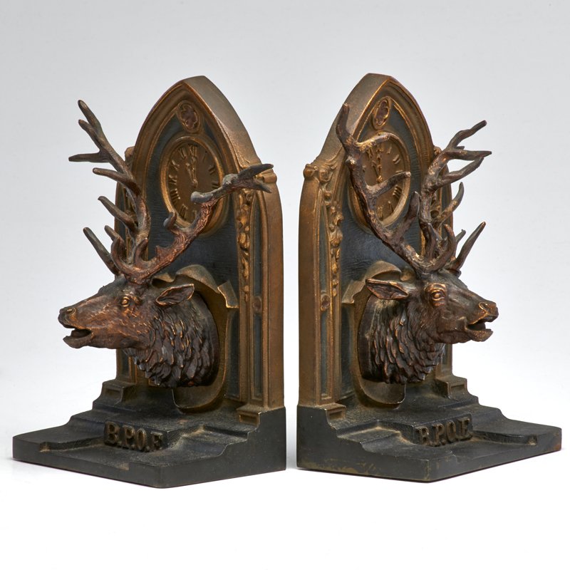 BRADLEY AND HUBBARD BRONZE BOOKENDS: Order of the Moose 11th hour; signed; early 20th c.; Each: 8" x 5" x 4"
