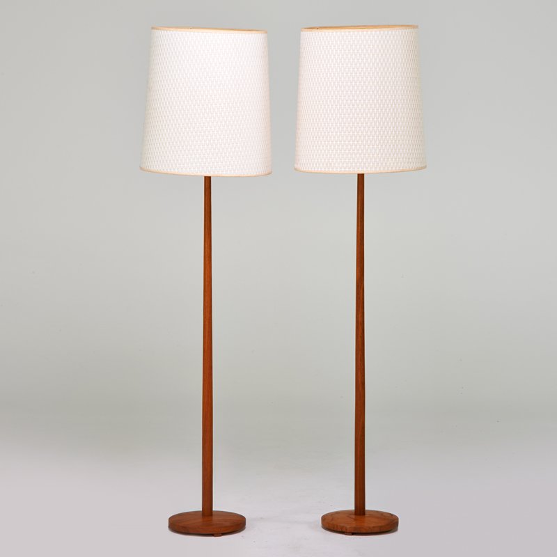 SWEDISH: Two teak floor lamps, 1960s; Metal Kovacs labels; 62" x 16" dia.