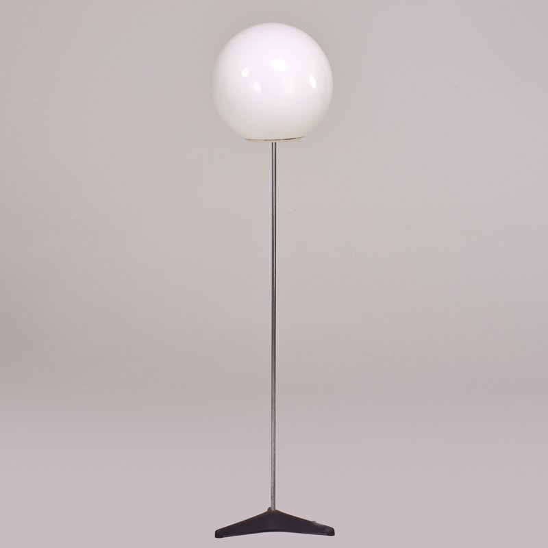 RAAK: Floor lamp, The Netherlands, 1970s; Enameled cast iron, chromed steel, cased glass; 57" x 13" dia.