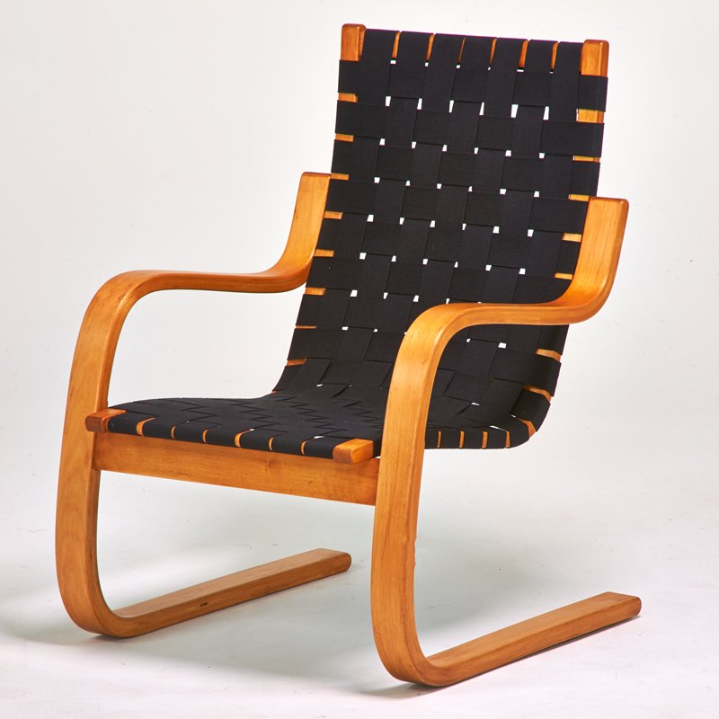 ALVAR AALTO; ARTEK: Lounge chair 406, Finland, 1940s; Laminated birch, webbing; Unmarked; 34 1/2" x 23" x 29"