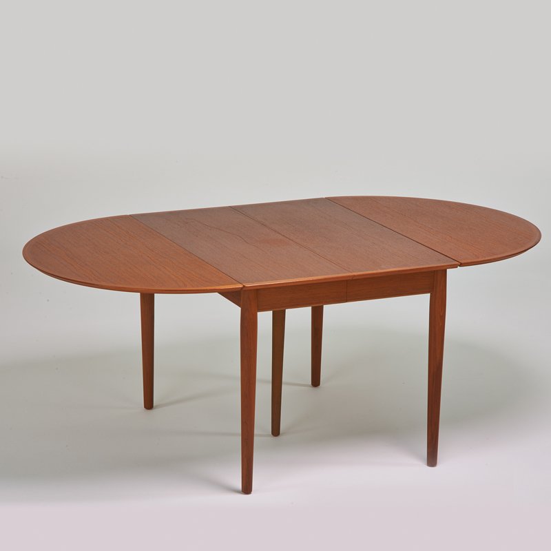 ARNE VODDER; SIBAST: Drop-leaf extension dining table with two 19 1/2" leaves, Denmark, 1970s; Teak; Foil label; As shown: 28 1/2" x 72" x 41 3/4"