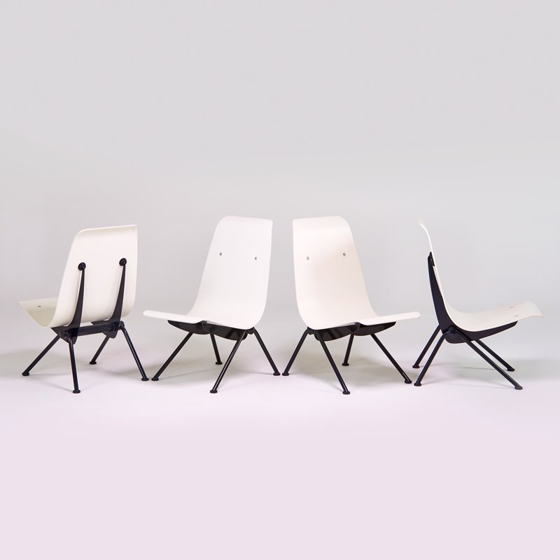 JEAN PROUVE; VITRA: Set of four "Antony" lounge chairs, Switzerland, 1954-2002; Enameled steel, painted wood, aluminum; Metal labels; Each: 34 1/2" x 20" x 27"
