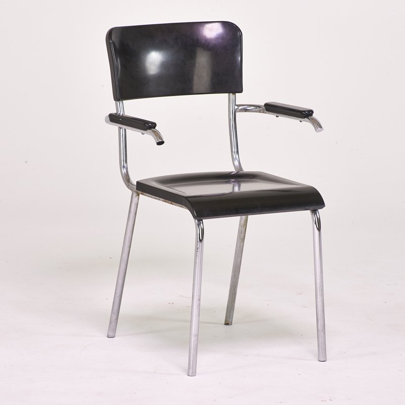 RENE HERBST: Arm chair, France, ca. 1930; Bakelite, chromed steel; Unmarked; 33" x 21" x 20"