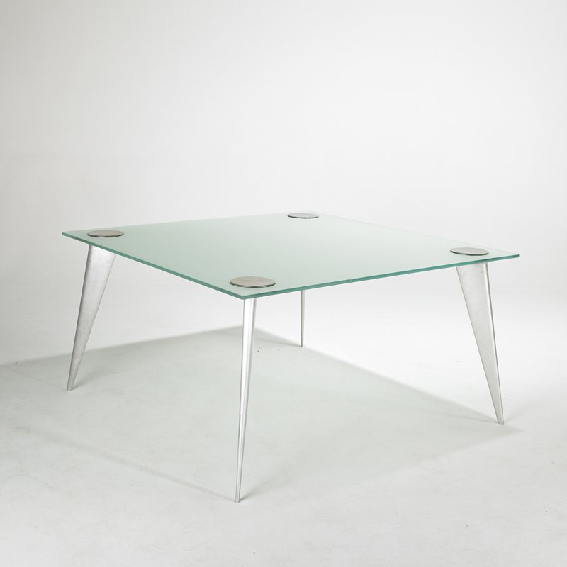 PHILLIPE STARCK; DRIADE: Dining table, France, 1980s; Frosted glass and polished aluminum; Unmarked; 28 1/2" x 53" x 53"