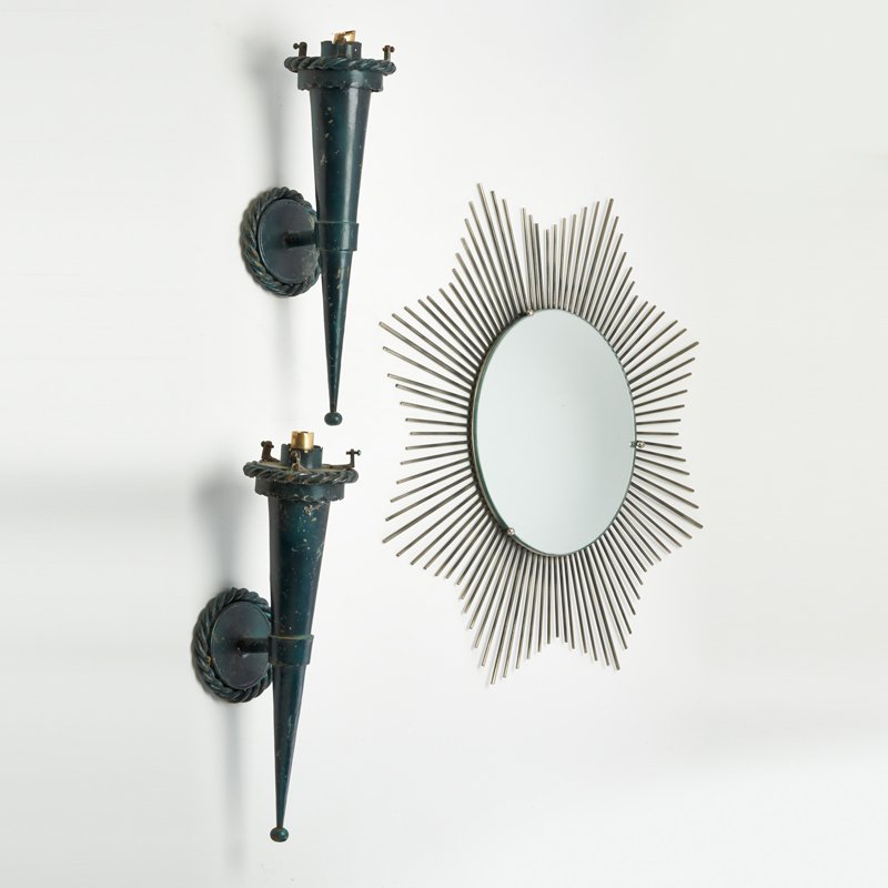 HOLLYWOOD REGENCY: Starburst wall mirror and pair of deco-style sconces, ca. 1970s; Brass, mirrored glass; Unmarked; Mirror: 23 1/2" x 23 1/2" x 6 1/4", sconce: 19" x 11 1/2" x 5"