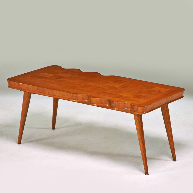 STYLE OF JEAN ROYERE: Coffee table, France, 1920s; Oak, sycamore; Unmarked; 19" x 43 1/2" x 22"